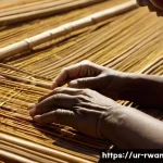 르완다의 전통 직물 산업 - **Prompt 1: The Artisan's Legacy**
A close-up, high-definition photograph capturing the hands of...